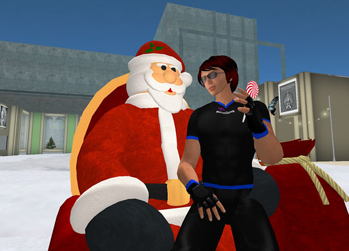 Dale Innis in Santa's lap, with lollipop