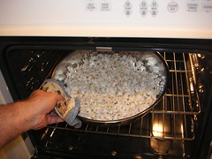 Put into pre-heated oven to help make the popcorn crisper.