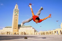 Mustafa doing another (joelfrijhoff) Tags: africa street trip vacation urban dance jump mosque morocco flip hiphop rap breakdance float mustafa hassanii canoneos30d joelfrijhoff canon1855mm3556 dinozors wwwjoelfrijhoffcom