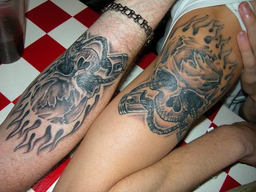 piston tattoos. Father and son tattoos