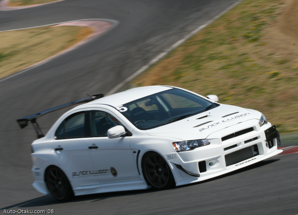Edit more pics of the kit on a white and red Evo X courtesy of AutoOtaku