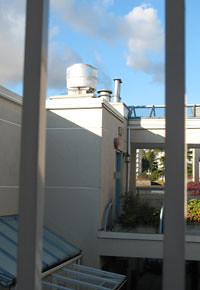The ventilation fan (extreme left) on top of the restaurant as seen from the apartment hallway
