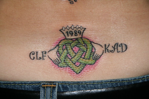 Claddagh and clover tattoo