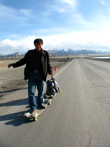 Enthusiastic local on the board near Santai, Xinjiang Province, China