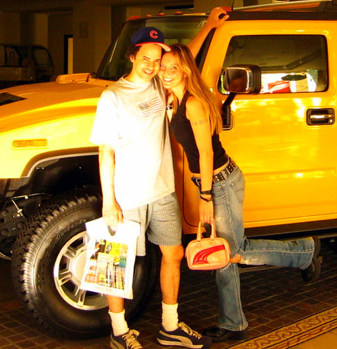 karisa and tony pierce in front of his old hummer at the grove in hollywood california