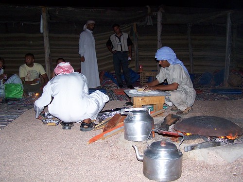 The Bedouin men cooking
