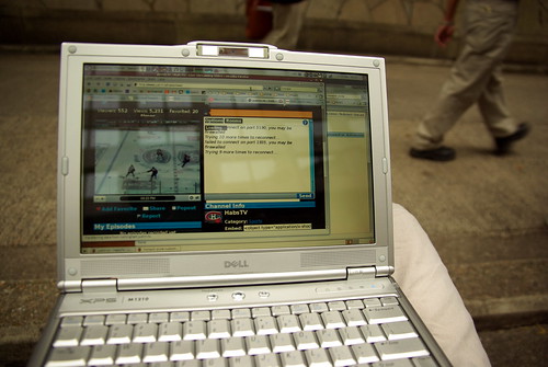 Laptop w/ streaming hockey game in HK