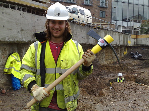 Its a mattock, and yes, it's Gary Webster holding it.  How we miss his hair