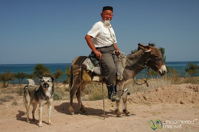 Kyrgyz man on horse at Lake Issyk-Kul