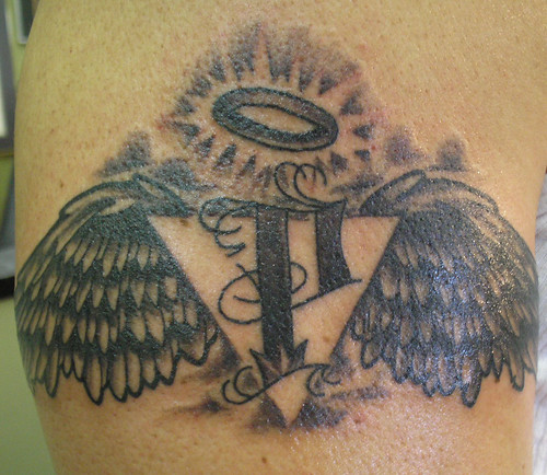 angel halo tattoo. wings tattoo