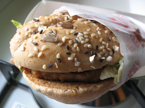 fat guy eating cheeseburger. Multigrain urger it#39;s