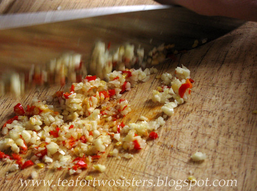 Minced garlic and Thai bird chili peppers