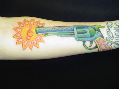 Revolver Tattoo. Jimmy Kuder III tattoos at Nowhere Fast Tattoo 