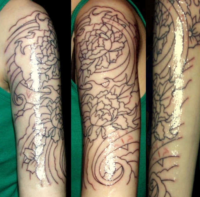 This is my new tattoo. It's a Japanese-style half-sleeve on my left upper 