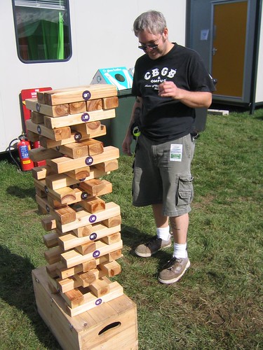  of a good game of giant Jenga and has tattoos of dead people on his arm.