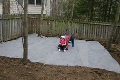Anna on her new playplace, before it gets mulch
