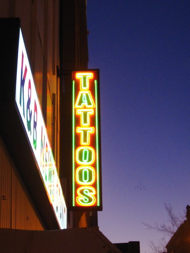 neon tattoo sign. I like the neon TATTOOS sign,