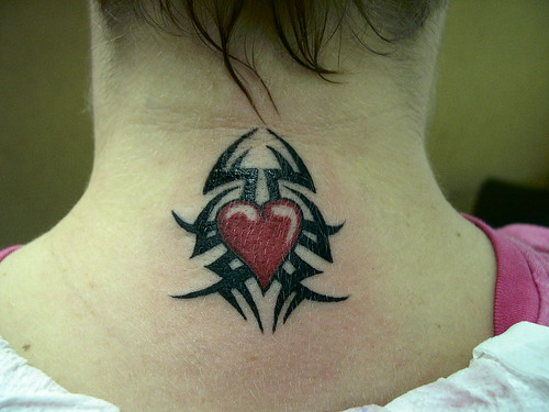 Unique Tribal Heart Tattoo in Neck