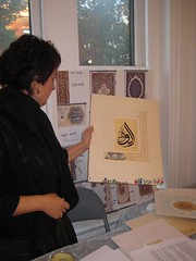 Gulhis Diptas demonstrating her art during her exhibition in Washington, D.C.