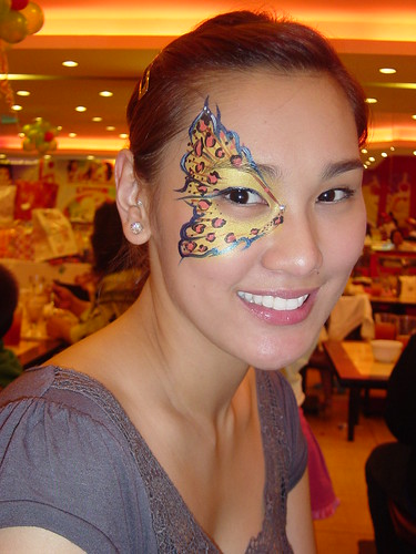 Beautiful Asian girl with lower back Temporary tattoo, leopard butterfly