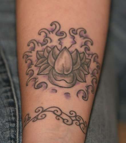 Tattoo 4 Variation of a Lotus flower and Japanese waves