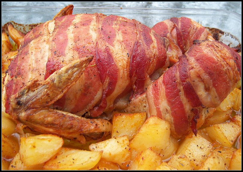 Whole chicken wrapped up in bacon