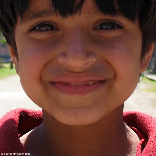 A little girl with a cute smile by Gaurav Dhwaj Khadka