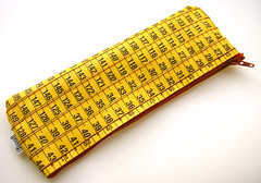 Yellow and Red Measuring Tape Case