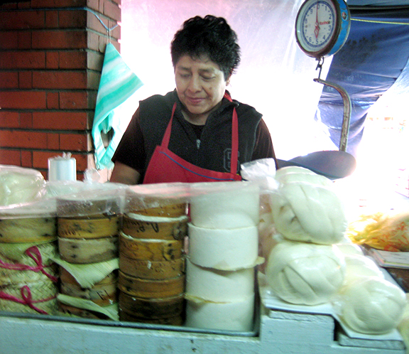 Oaxacan Woman selling Cheeses
