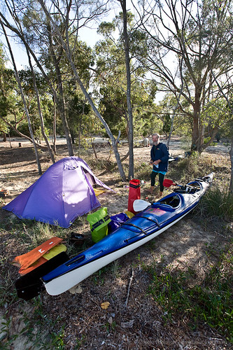 Geoff, his boat, his camp.