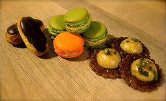 chocolate eclairs, orange and pistachio macarons, & pistachio creme brulÃ©e