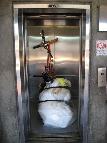 Xtracycle carrying foam in BART elevator
