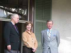 Mr. Moe, Mrs. Bush, and Dr. Milligan on the veranda at President Lincoln's Cottage.