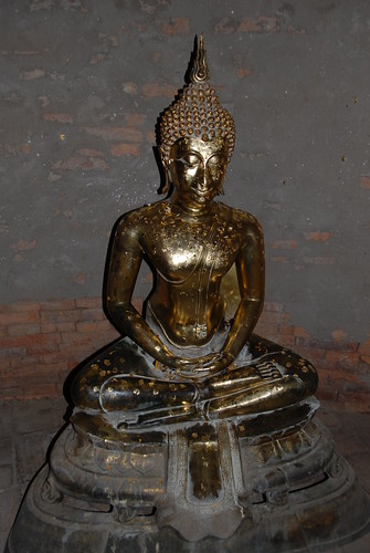 Bronze Buddha statue inside the main chedi (Wat Yai Chai Mongkol) by Adrian Lazar