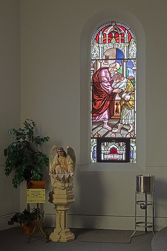 Saint Joseph Roman Catholic Church, in Bonne Terre, Missouri, USA - window and holy water fonts