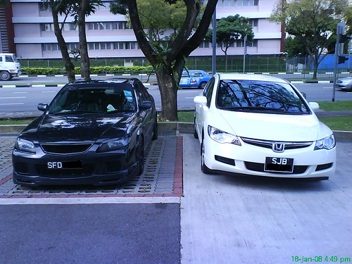My old black mazda protege new white civic FD side by side