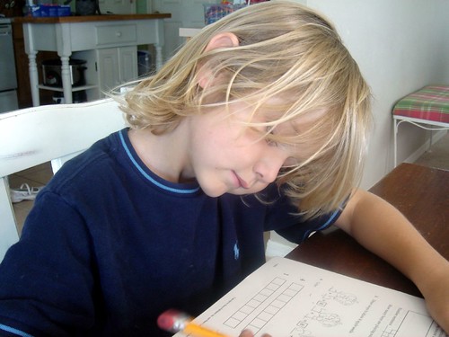 k schoolwork, hair in his face