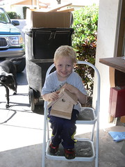 Zachary shows off his birdhouse