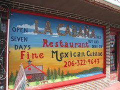 La CabaÃ±a recently repainted their cheery sign. Photo by Wendi