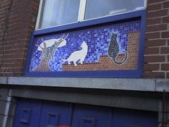Cat mosaic on house façade, Brussels, Belgium,...