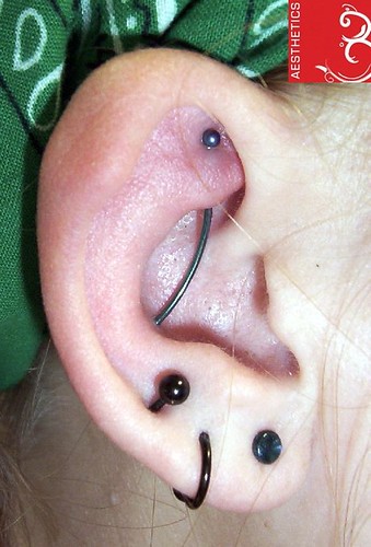  18g Rook to Conch industrial piercing; ? Oldest photo
