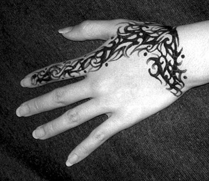 tribal hand tattoo