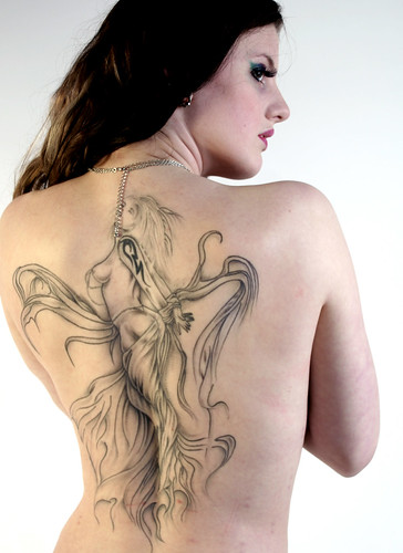  +80 | Beautiful tattoo on womans back 
