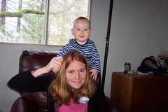Talia sets on Mommy's head