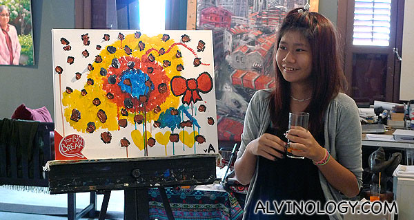 Angie with her artwork