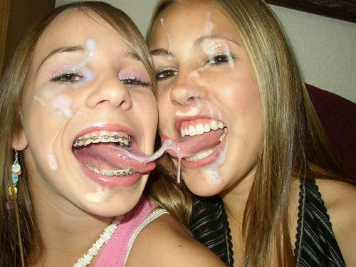 Two gals one with braces covered in cum