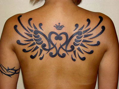 tattoos for women on back. Tribal Tattoos Women in Back
