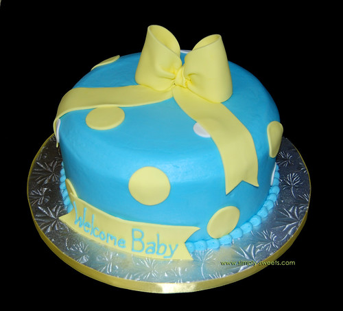 Baby boy shower cake blue with white and yellow polka dots