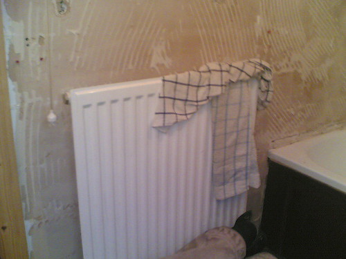 The radiator that WAS in the bathroom