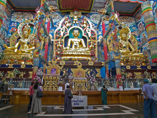 the golden temple inside. Inside the Golden Temple is a huge prayer hall, where three great buddha